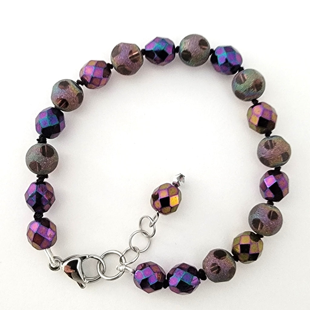Purple glass beaded bracelet.