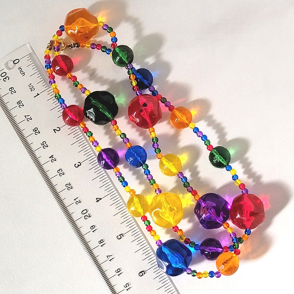 Rainbow vintage necklace with ruler.