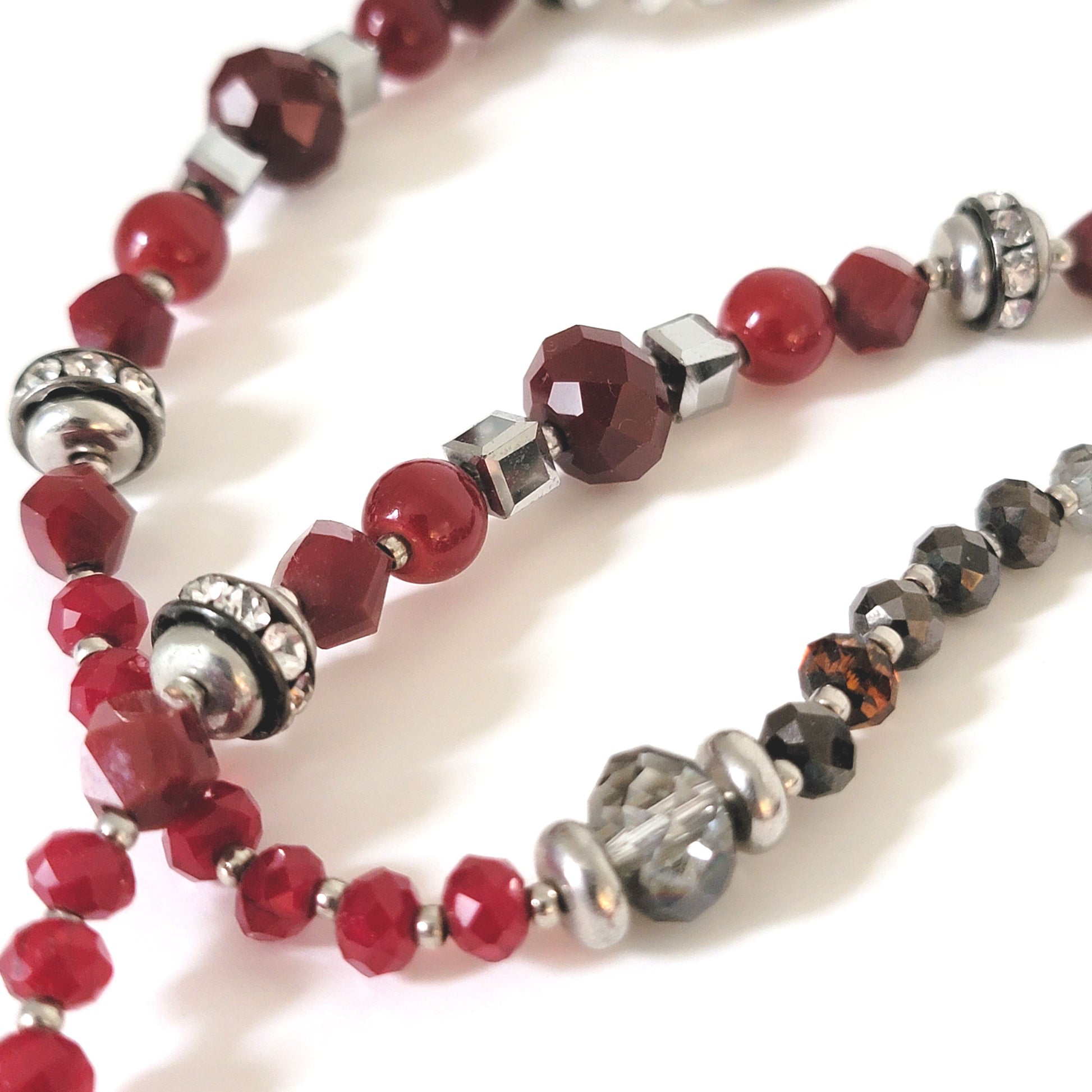 Red and silver faceted glass beads.