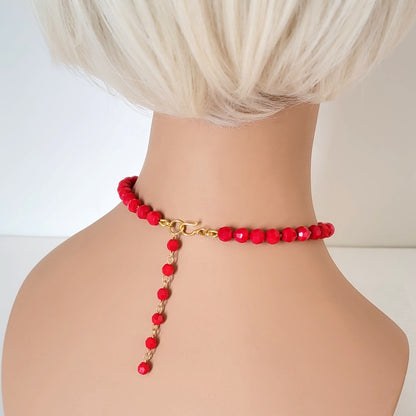 Red glass beaded choker, back view on a mannequin, showing extender chain.