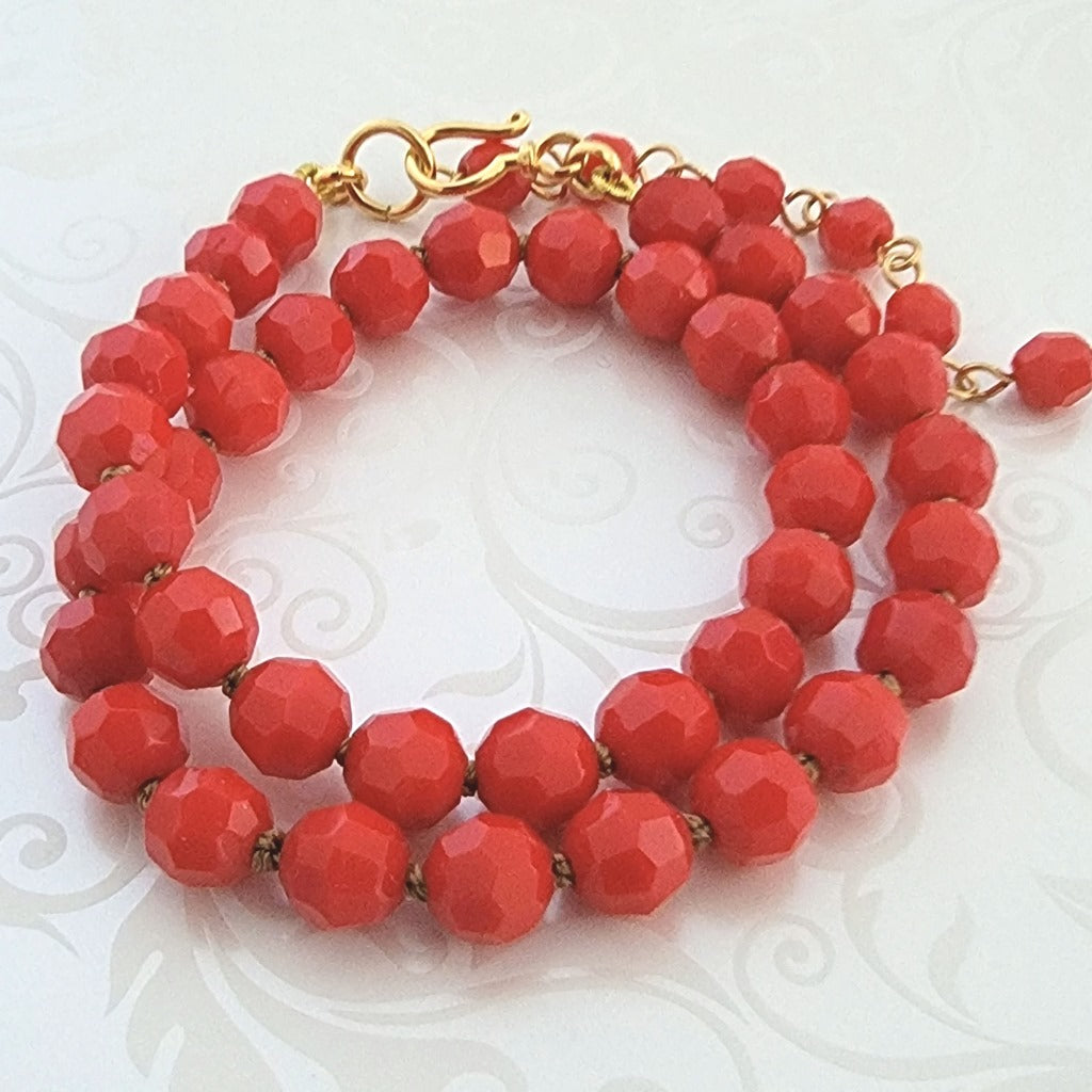 Red faceted Czech glass beaded choker, hand knotted.