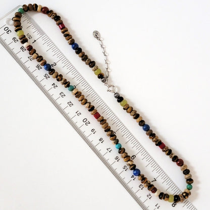 Gemstone necklace with ruler.