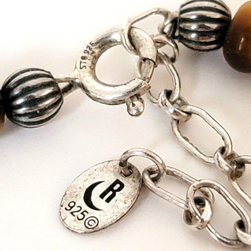 Sterling silver clasp.