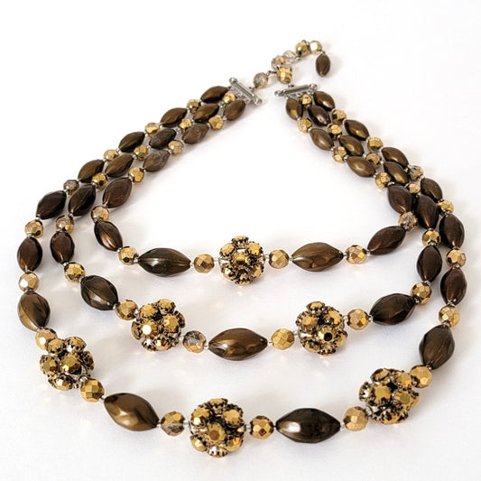 Brown and gold three strand necklace.