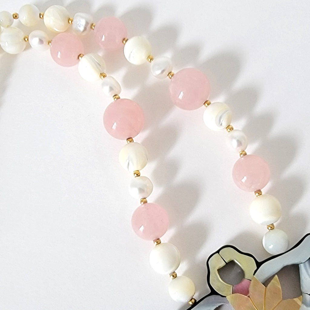 Rose quartz and pearl beads.