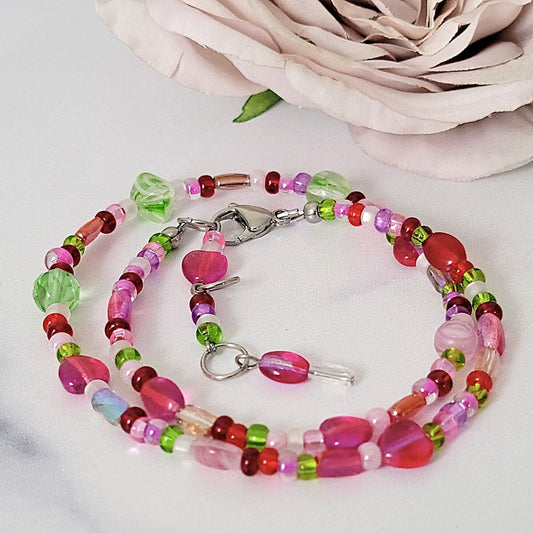 Pink and green glass choker necklace.