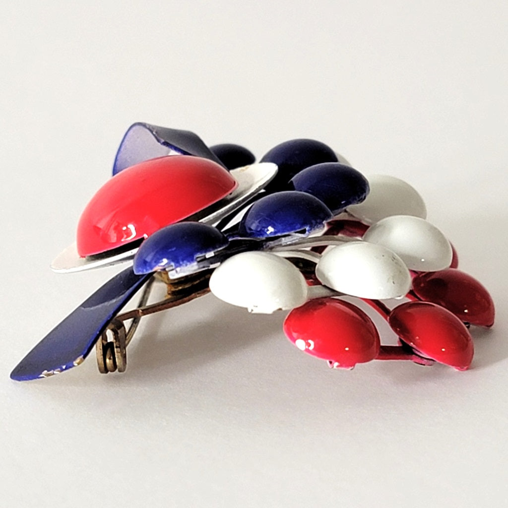Side of layered brooch.