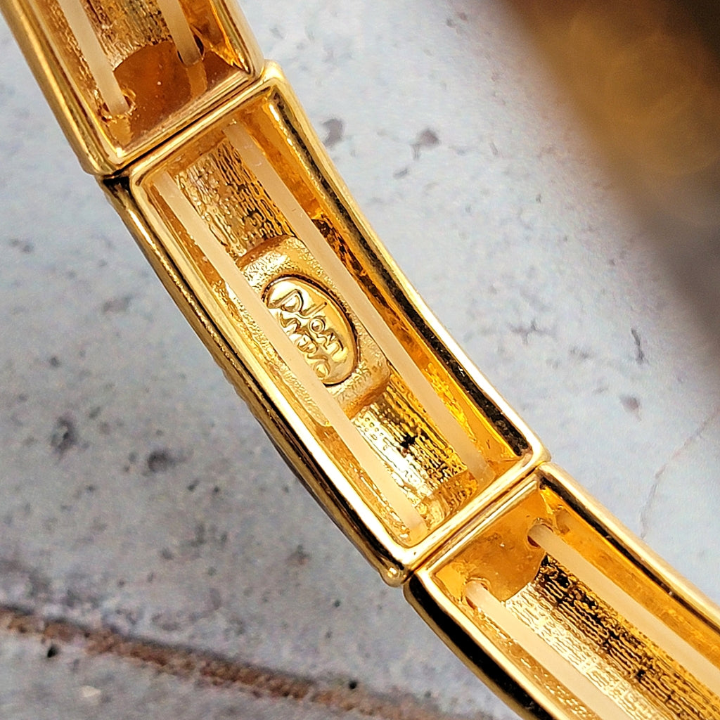 Joan Rivers signature mark on jewelry.