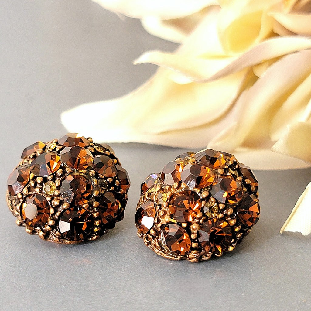 Topaz crystal button style earrings.