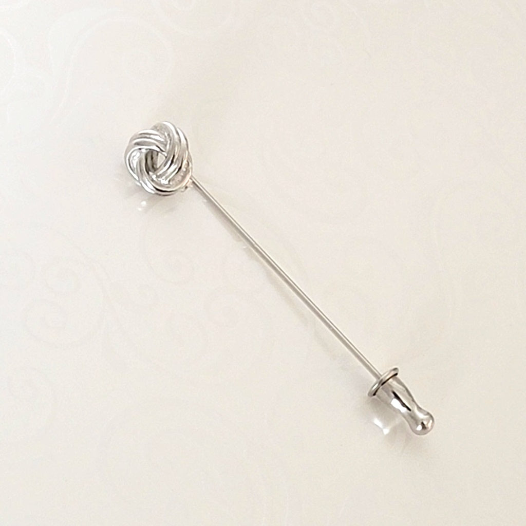 Monet vintage silver tone lovve knot stick pin.