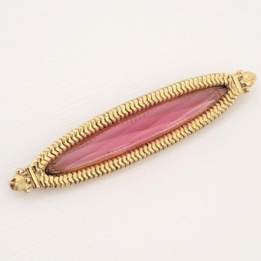 Pink 1928 bar brooch.