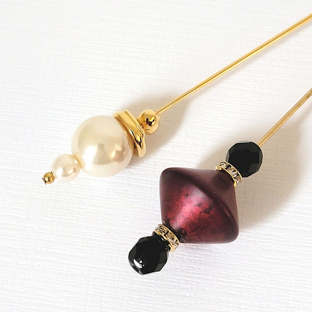 Two vintage 80s style stick pin tops.