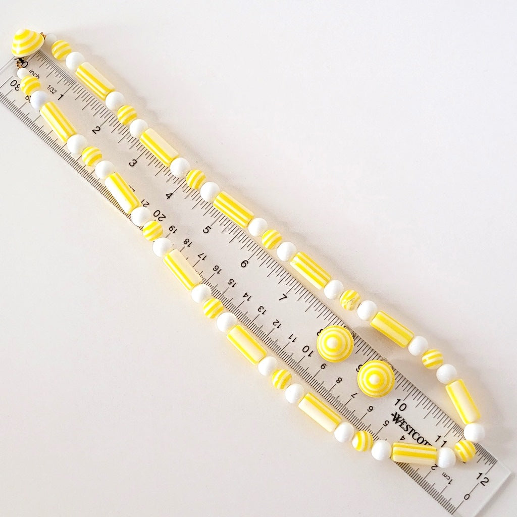 Necklace and earrings with ruler.