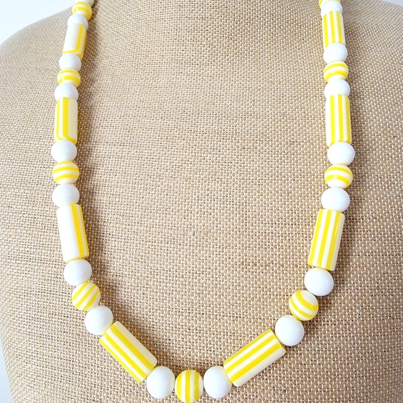 Yellow lucite necklace.