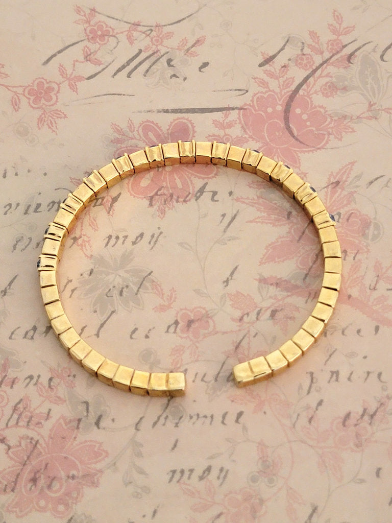 Joan Rivers icy blue rhinestone bracelet, skinny gold tone, flexible