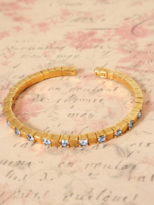 Joan Rivers skinny blue rhinestone bracelet, gold tone cup chain on memory wire