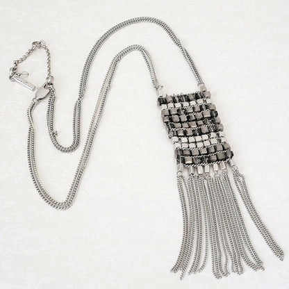 Kenneth Cole long silver tone fringe pendant necklace.
