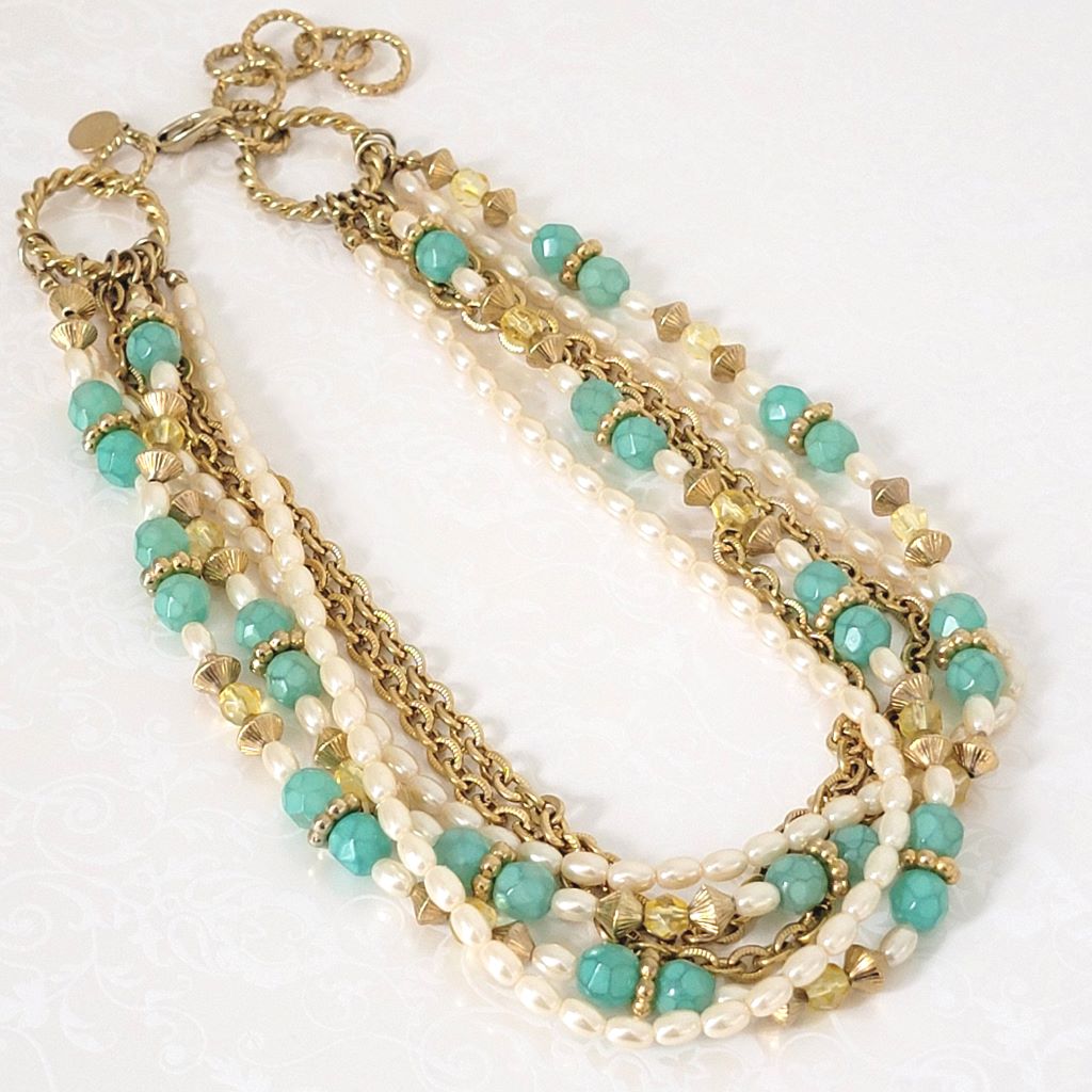 Sarah Coventry faux pearl and sea green, multistrand choker necklace, with gold tone chains.