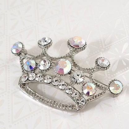Rhinestone crown brooch, silver tone, with aurora borealis accents.
