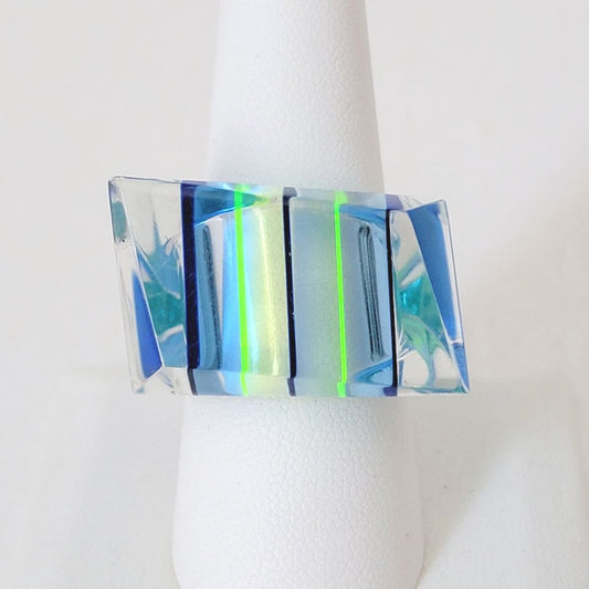 Mod style blue and neon yellow striped acrylic ring.