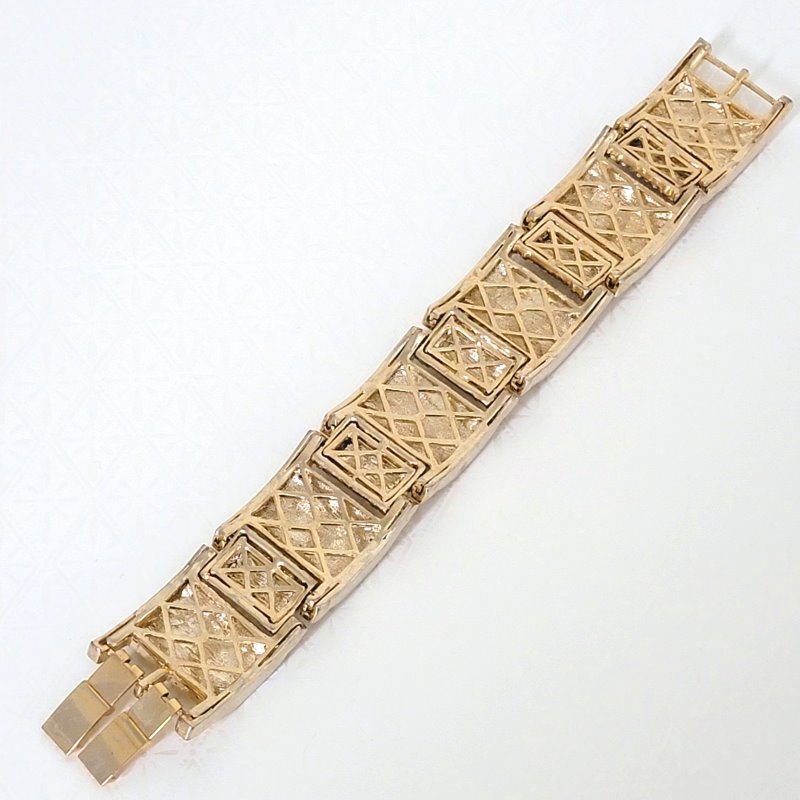 Back view of open links on a big pave rhinestone bling bracelet.