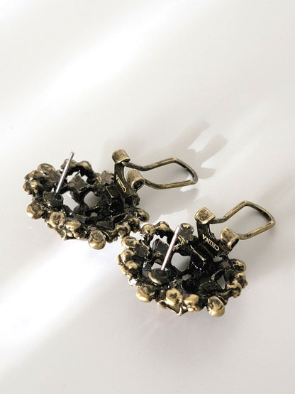 Back view of purple rhinestone crystal earrings.