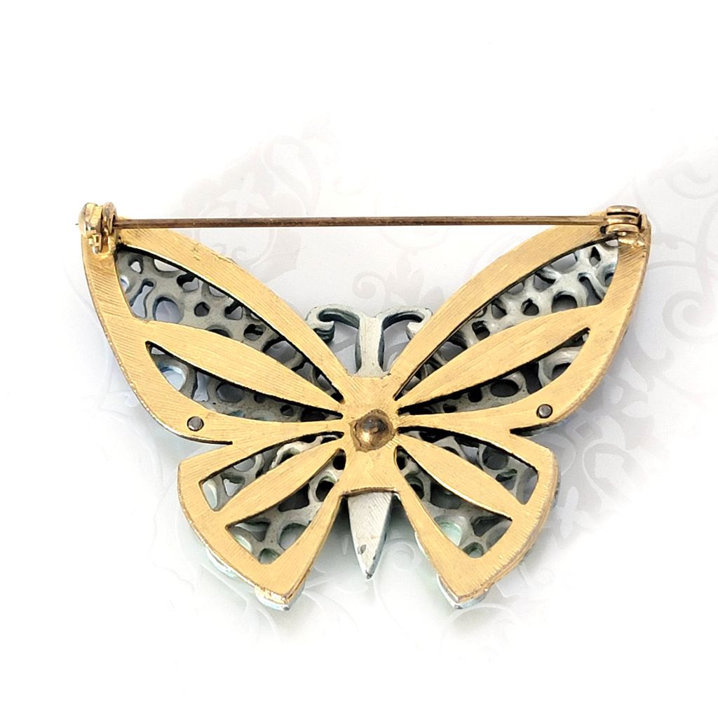 Back view of vintage butterfly pin, with layered construction.