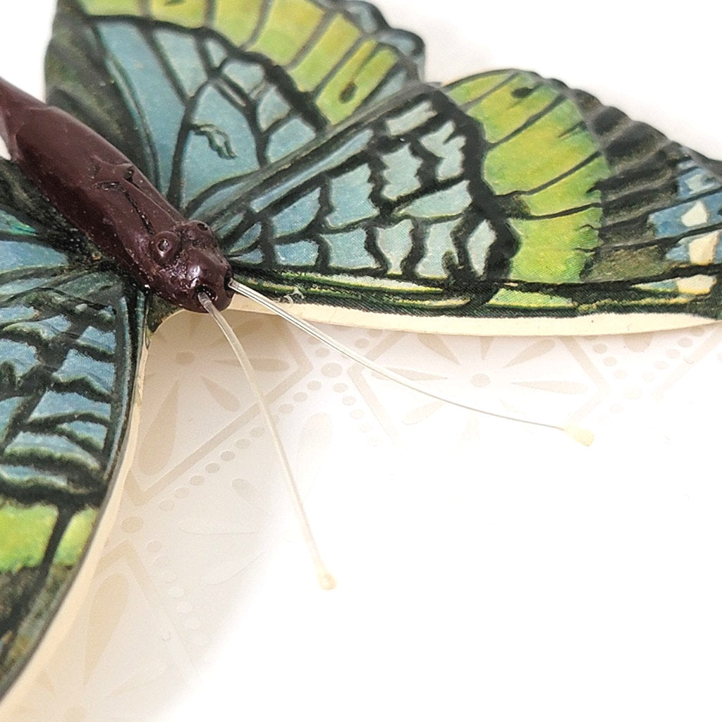 blue-and-green-plastic-butterfly-pin-antennae