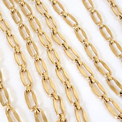 Closeup view of gold tone Monet necklace links.