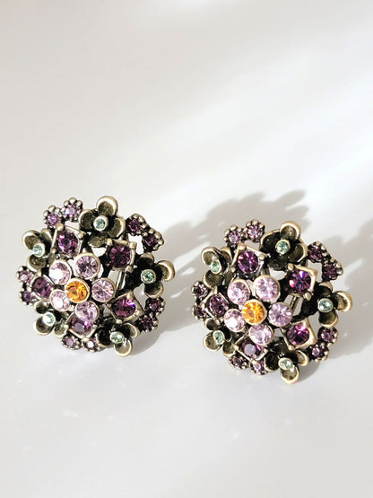 Rhinestone post earrings, in antique gold tone floral settings, with jewel tone crystals.