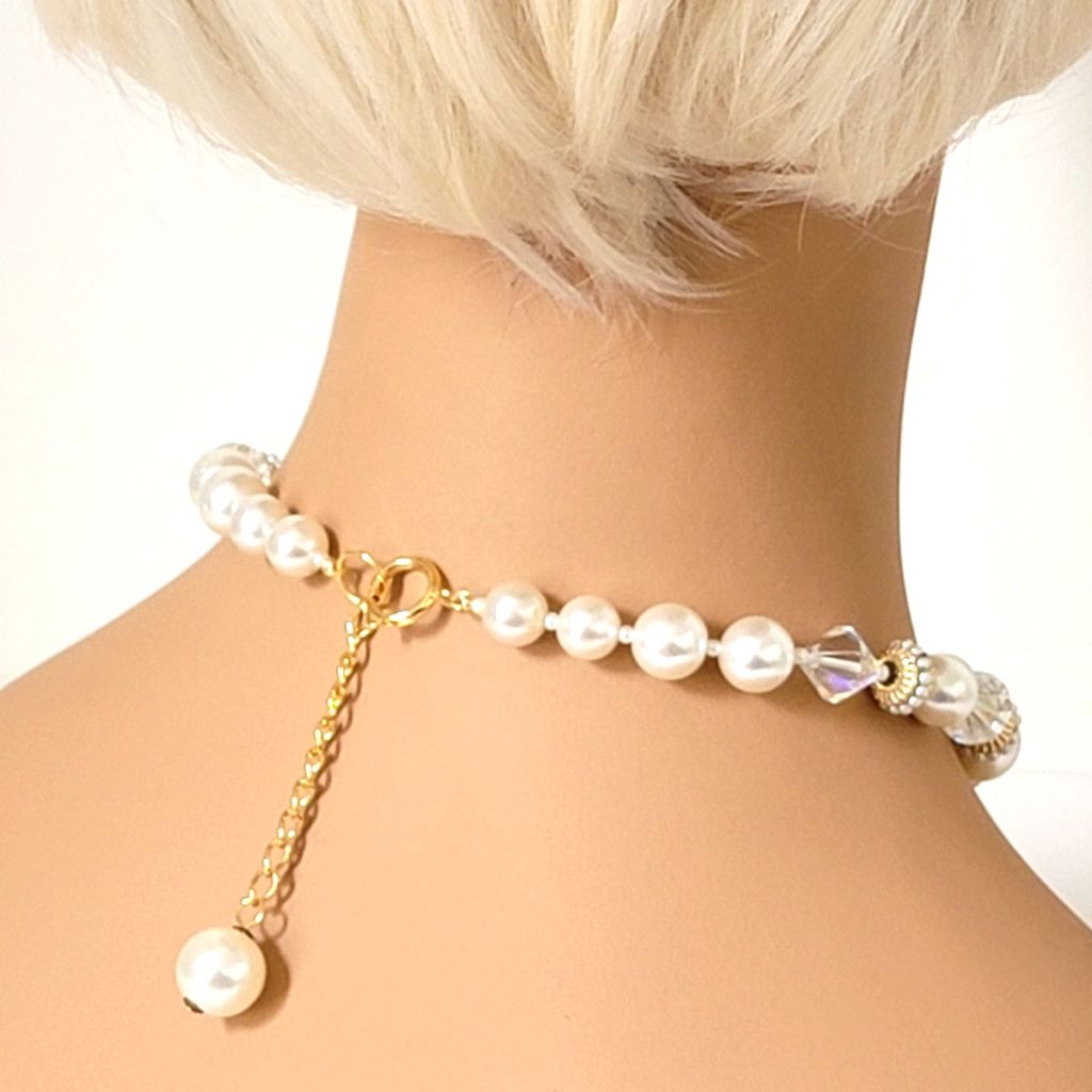 Back view of chunky faux pearl choker, with extender chain, shown on a mannequin.