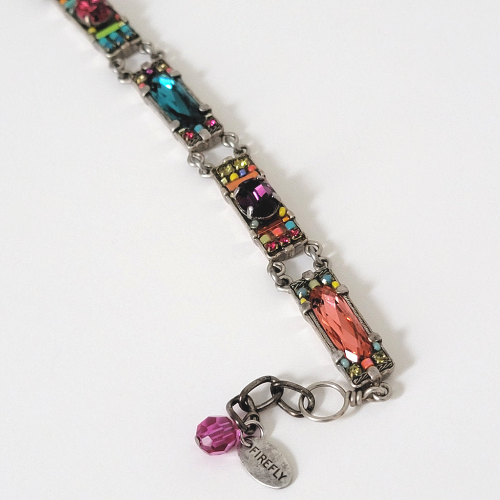 Firefly multicolor crystal bracelet with logo tag.