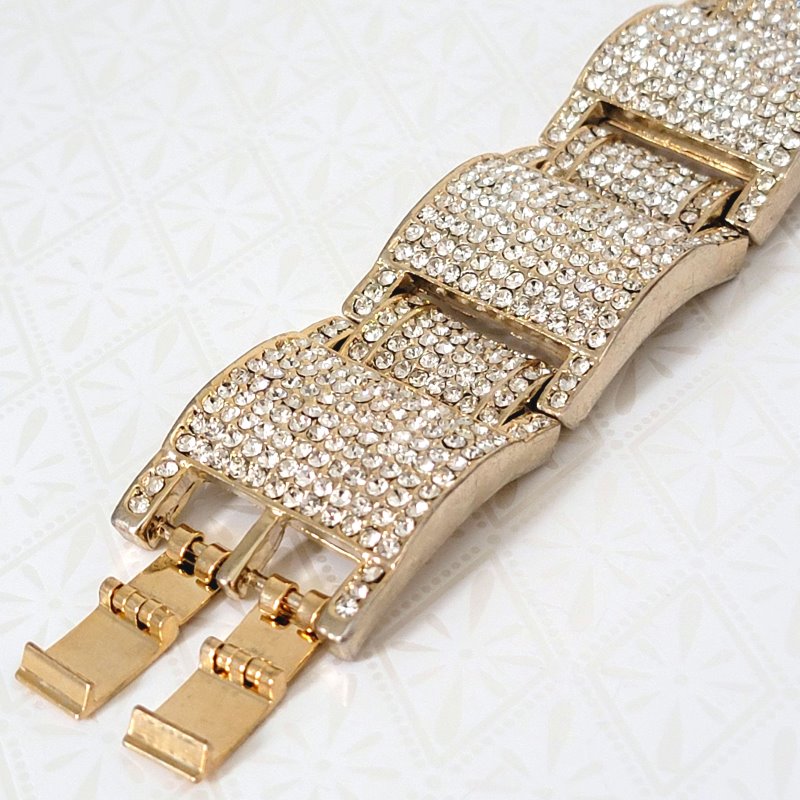 Closeup of double clasp on heavy pave rhinestone bling bracelet.