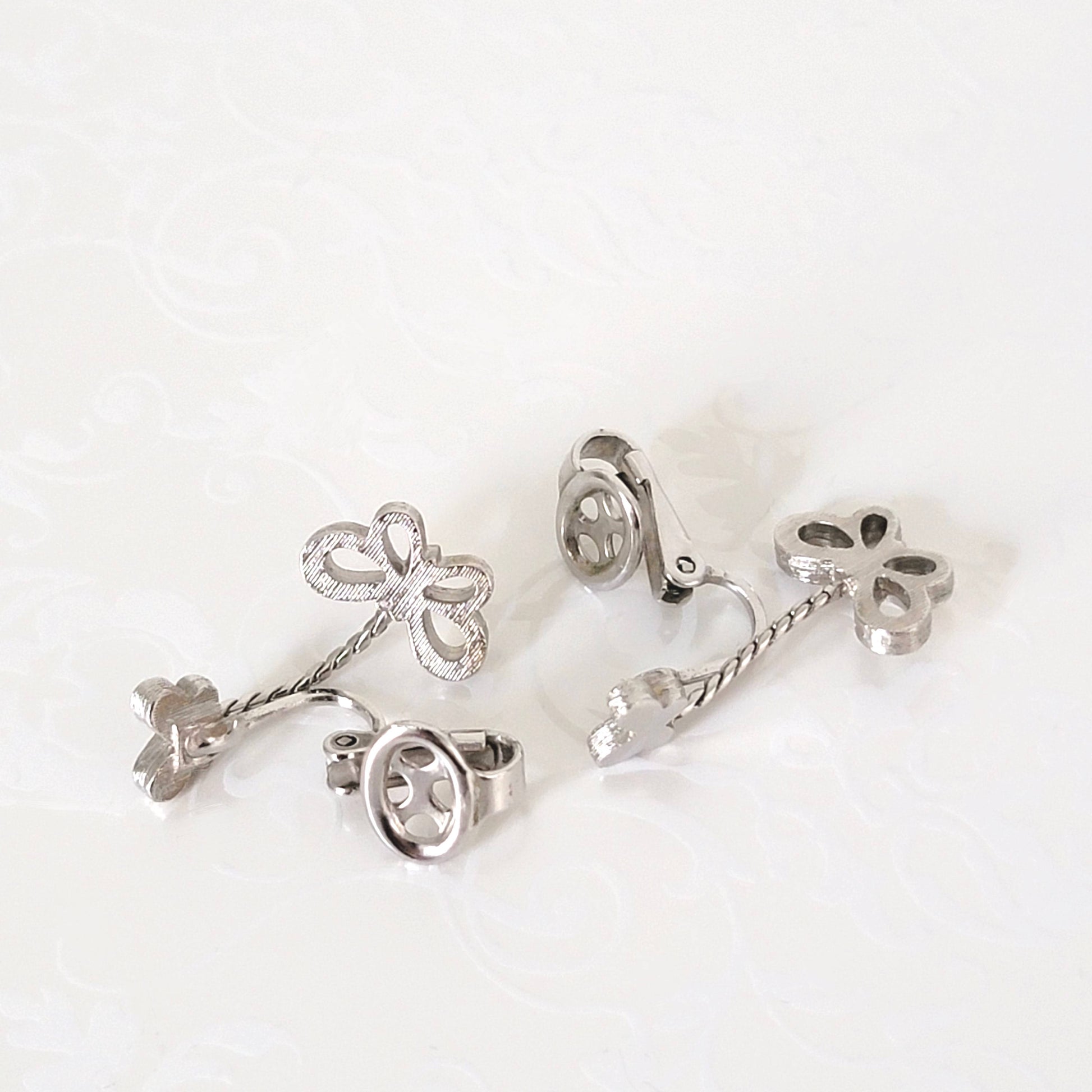 Inside view of Crown Trifari clip earrings.