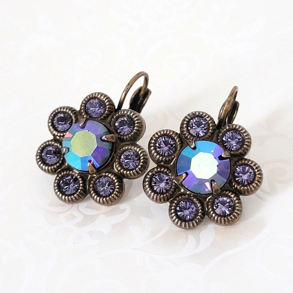 Kirks Folly purple and AB rhinestone cluster earrings, in antique gold tone settings.