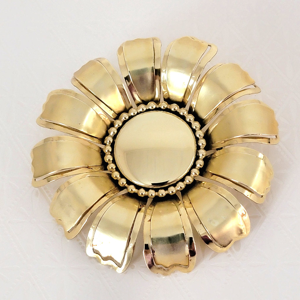 large gold tone 60s vintage flower pin