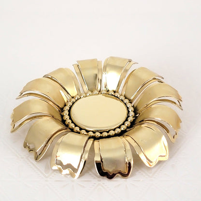 gold tone vintage flower pin, side view