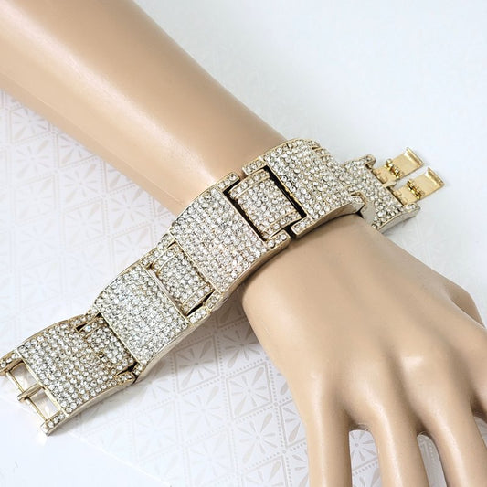 Large chunky pave rhinestone bling bracelet, shown on mannequin wrist.