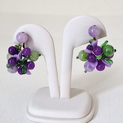 Purple and green fruit salad dangling clip on earrings.