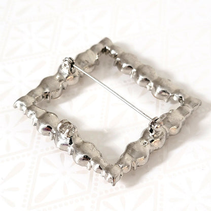 back view of square rhinestone pendant brooch, showing loops