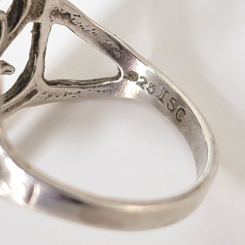 Inside sterling silver ring, showing 925 ISC marks.