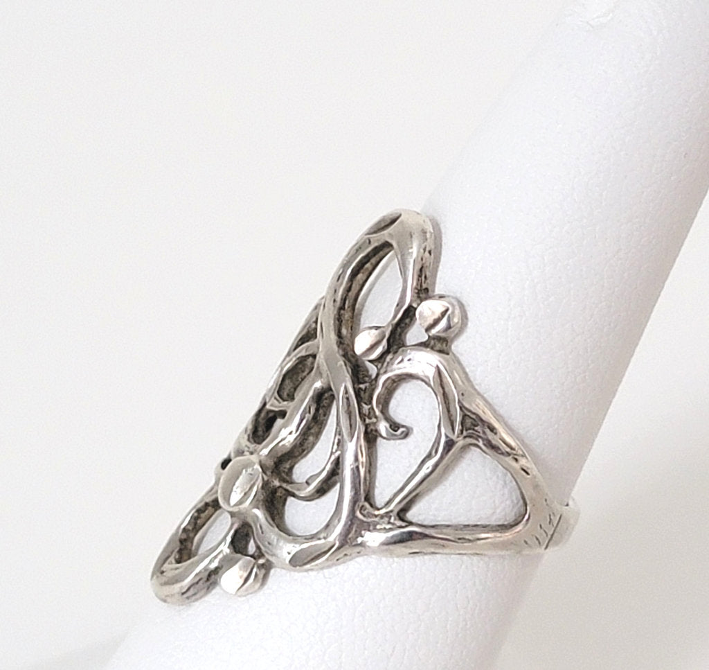 Side view of silver ring, size 6.25, by ISC.
