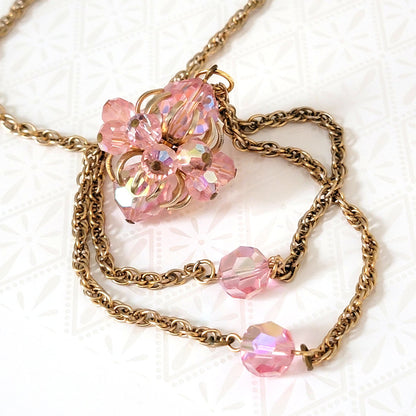 Vintage pink glass beaded pendant necklace, with long, gold tone rope chain.