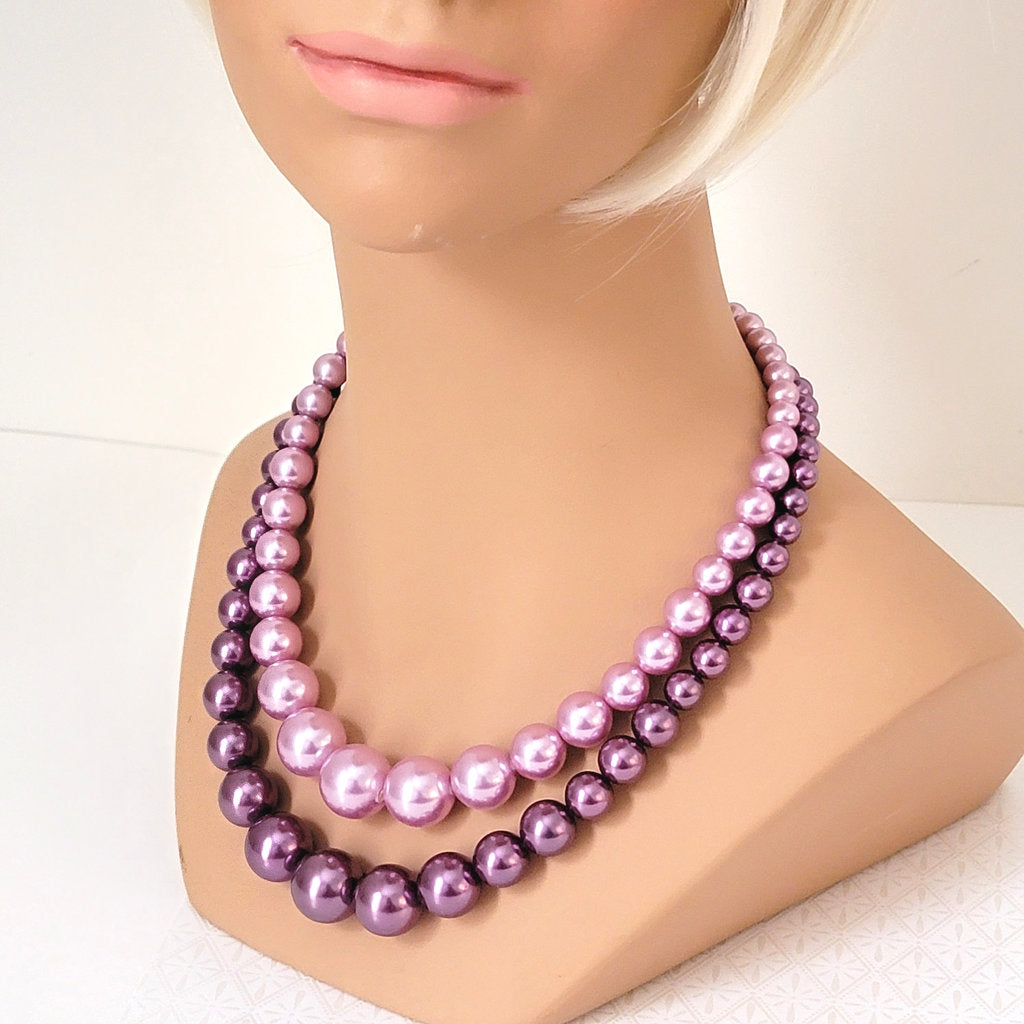 Vintage two tone purple faux pearl choker, on a mannequin display bust.